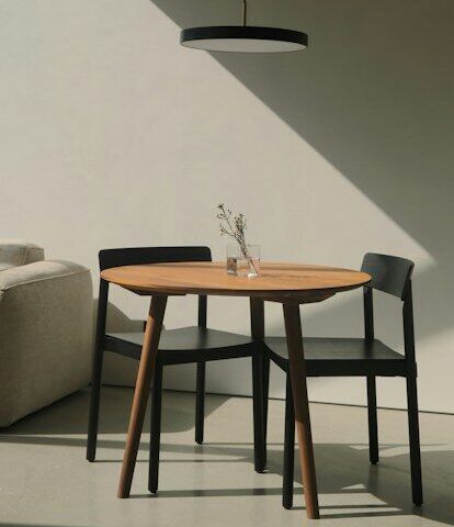 A living room with a couch and a table